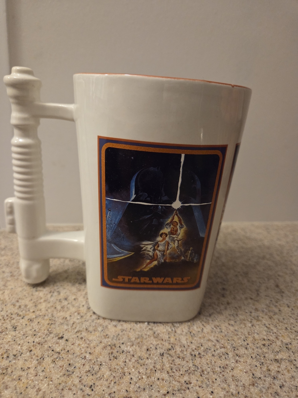 Collectible Disney Star Wars Mug With Lightsaber Handle.